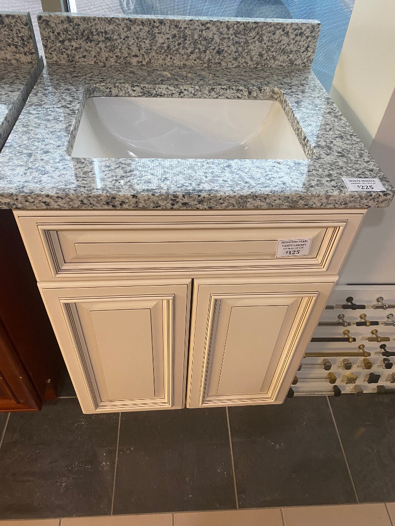 24 inch Signature Pearl cabinet with 26 inch Granite top